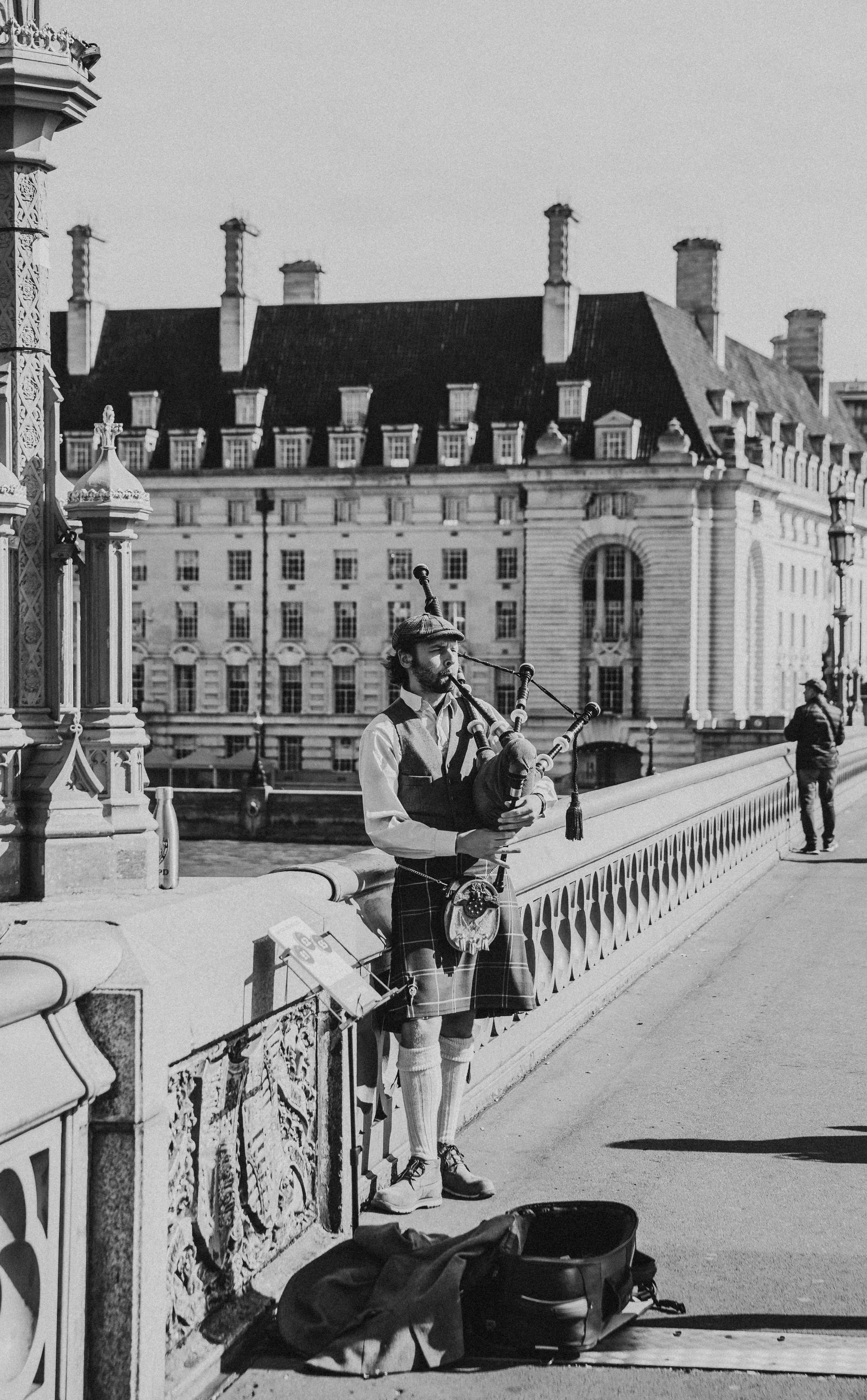 Traditional Scottish musicians performing live on stage in Edinburgh